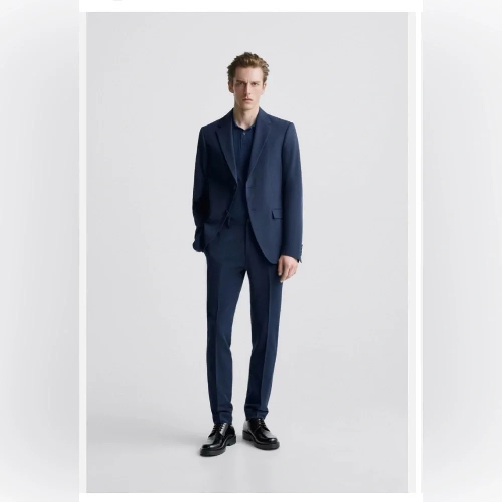 Zara man,Classic navy blue dress pants with a tapered fit. size 31,